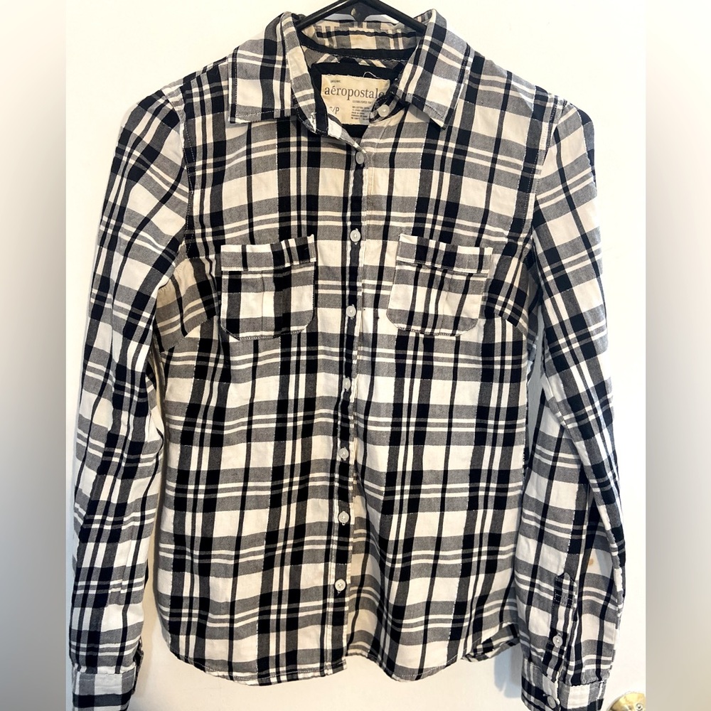 Buttoned down, small collar shirt